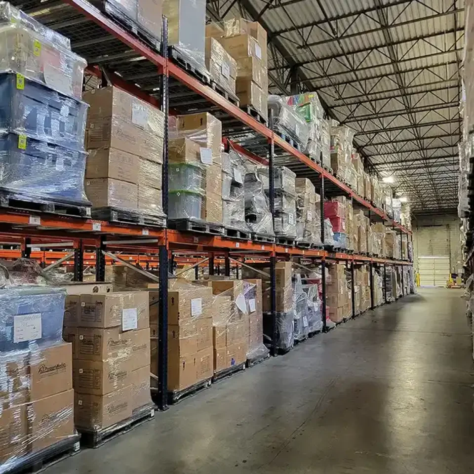 A warehouse with boxes wrapped in plastic